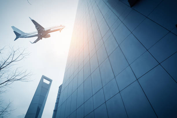 istock Shanghai's skyscrapers and airplanes on sky 835950170