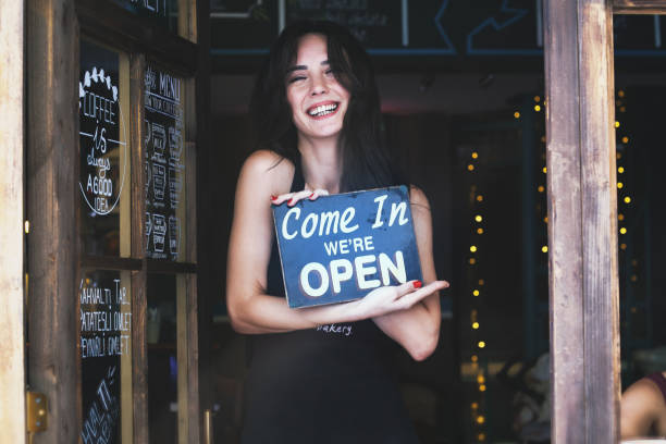 istock Woman opening a new coffee shop 835952662