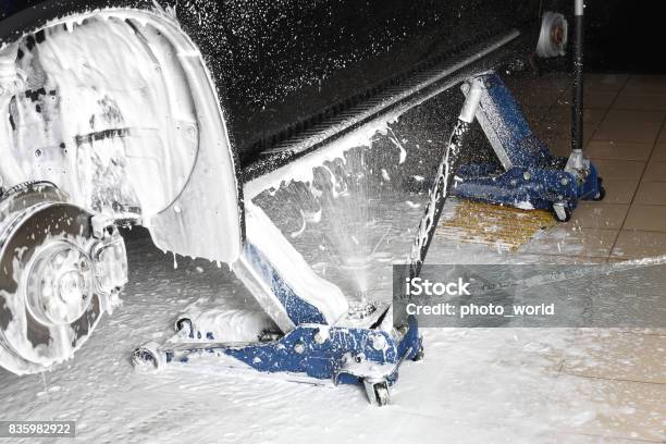 Car Service Washing Of A Wheel Niche Under Pressure Stock Photo - Download Image Now