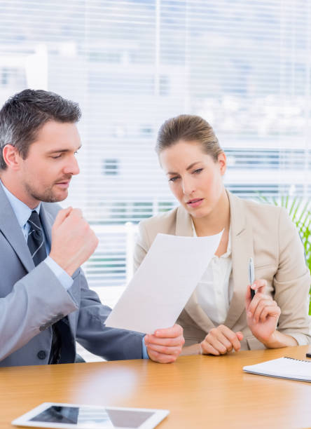 istock Smartly dressed colleagues in business meeting 835988766