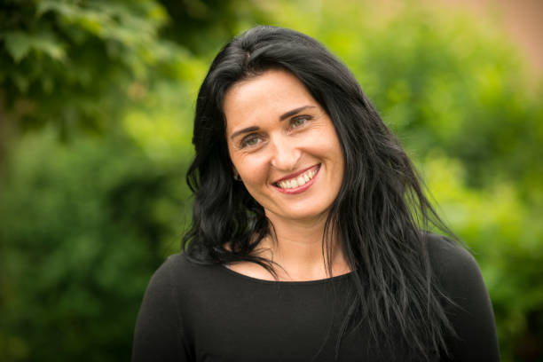 istock portrait of smiling woman looking at camera 835994502