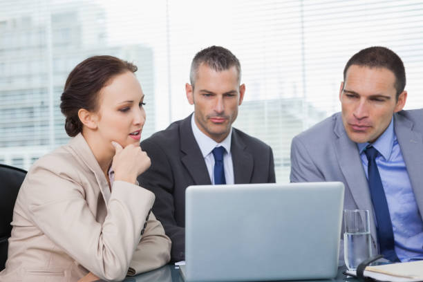 istock Colleagues working together on their laptop 835997996