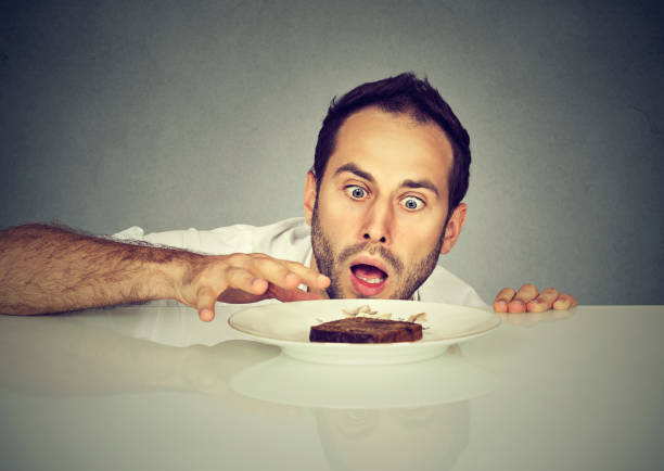 istock Hungry man craving sweet food 836002152