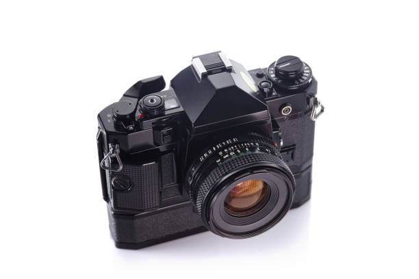 istock Old vintage film camera with lens on white background 836004828