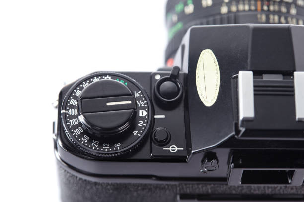 istock Old vintage film camera with lens on white background 836004840