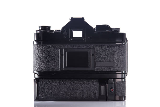 istock Old vintage slr film camera with winder on white background 836004852