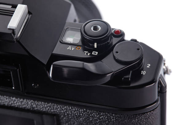 istock Old vintage film camera on white background 836004880