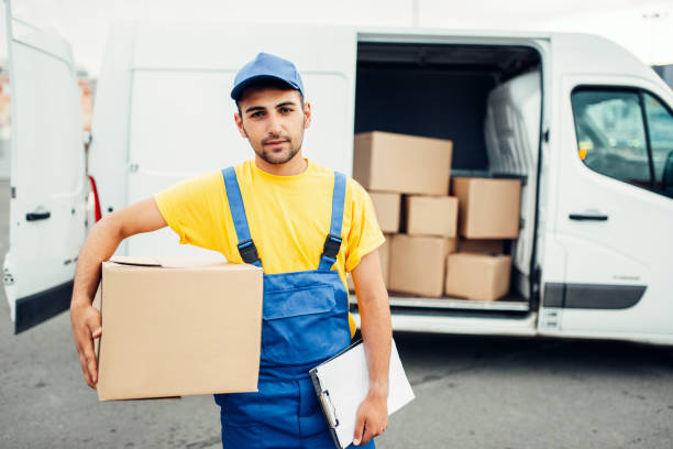 istock Cargo delivery, male courier with box in hand 836011632