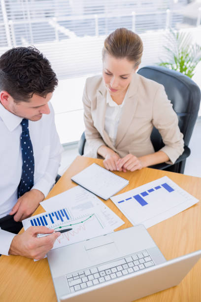 istock Smartly dressed colleagues in business meeting 836011786