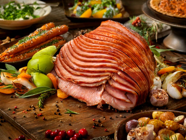 Holiday Spiral Ham Dinner Maple Glazed Spiral Ham Turkey Dinner Slice of Ham stock pictures, royalty-free photos & images