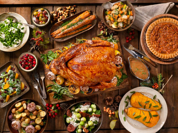 wakacyjna kolacja z indykiem - thanksgiving zdjęcia i obrazy z banku zdjęć
