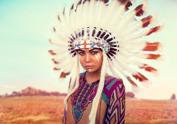 istock American Indian woman against mountain valley 836016020