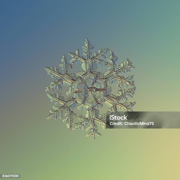 Snowflake Glittering On Smooth Gradient Background Stock Photo - Download Image Now - Abstract, Beauty In Nature, Blue