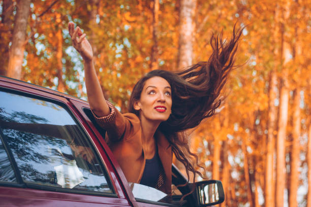 istock woman autumn car 836023584