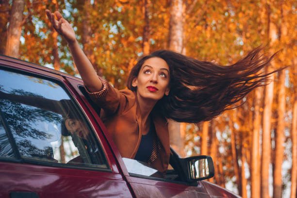 istock woman autumn car 836023588