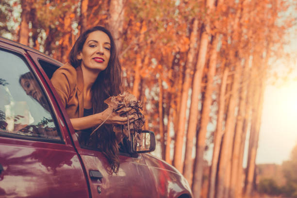 istock woman autumn car 836024002