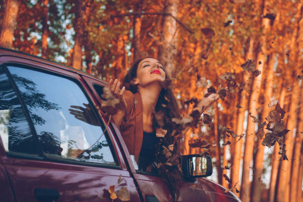 istock woman autumn car 836024016