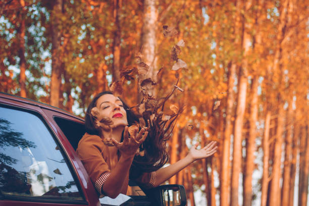 istock woman autumn car 836026810