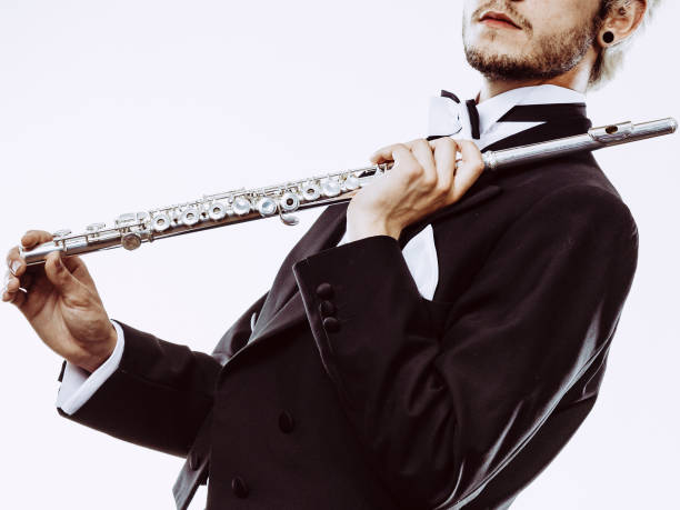 istock Male flutist wearing tailcoat holds flute 836034072