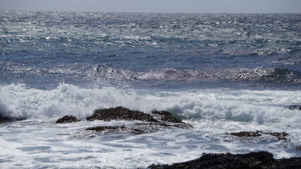 istock Ocean Waves Against the Rocks 836034158