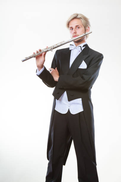 istock Male flutist wearing tailcoat holds flute 836036830