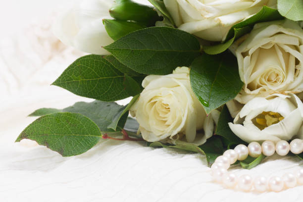 istock pink and orange roses with lace 836041750