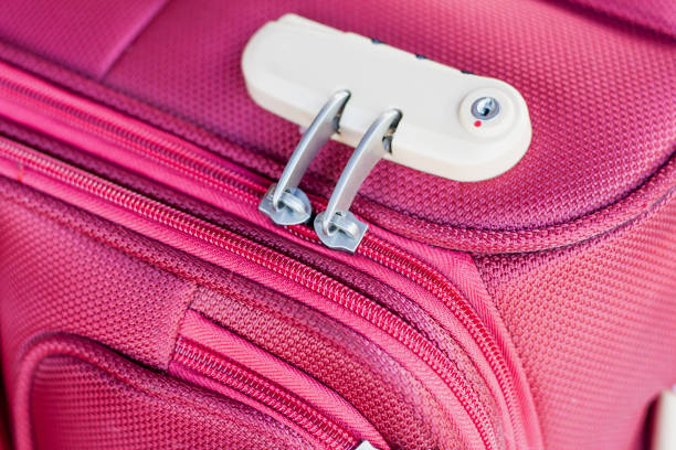 istock combination lock on red suitcase travel bag 836051206