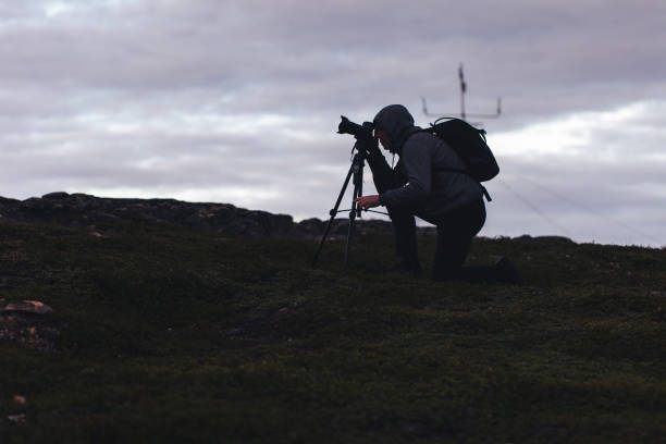 istock Videographer Photographer Works in the Mountains 836051520