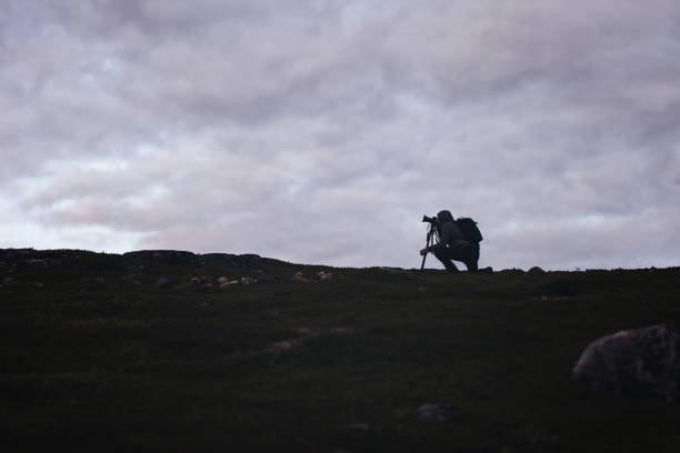 istock Videographer Photographer Works in the Mountains 836051526