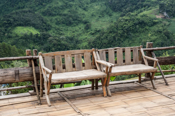 istock chairs in a wooden terrace natural hill background 836059026