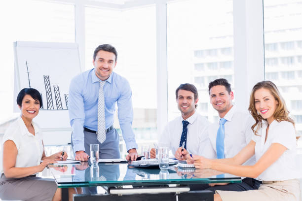 istock Business people in office at presentation 836062488
