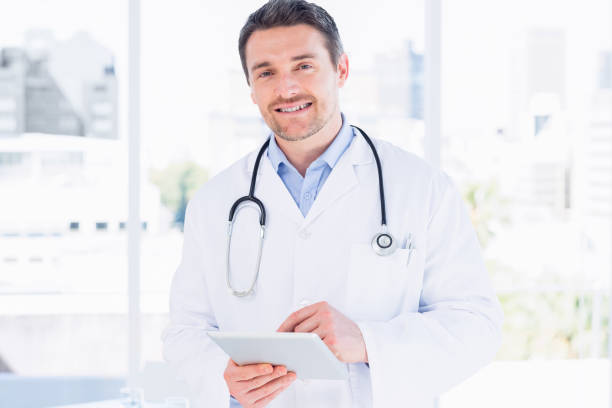 istock Portrait of a male doctor using digital tablet 836062576