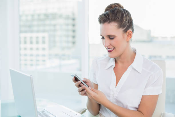 istock Happy classy businesswoman using phone 836066726