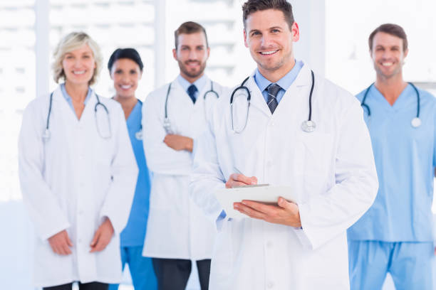 istock Confident happy group of doctors at medical office 836077310