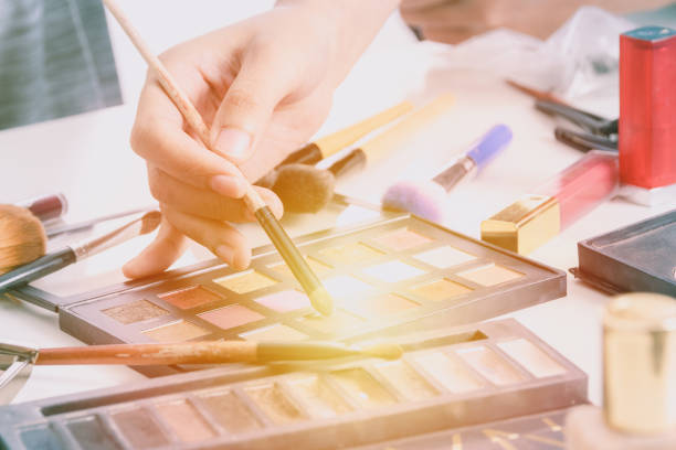istock Makeup artist hand using brushes powder foundation and tools of make up artist 836084090