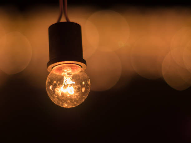 istock Illuminated light bulb at night, business idea concept 836084302