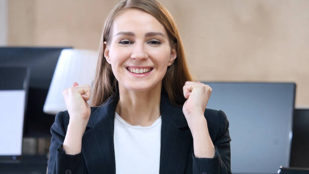 istock Overwhelmed Woman in Office Celebrating Success 836094480