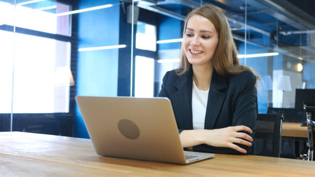 istock Happy Smiling Girl Looking in Laptop Screen 836094860