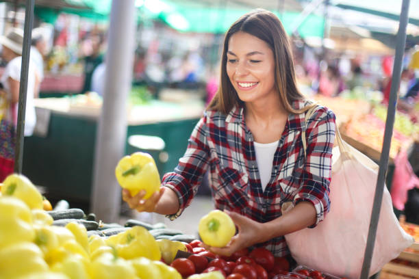 istock Woman buying peppers 836094890