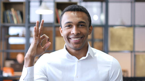 istock Okay Sign by Black Man in Office 836098292