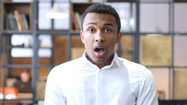 istock Wondering, Astonished Black Man in Office 836098314