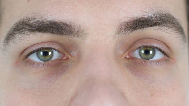istock Blinking Eyes of Young Man, Close Up 836098864
