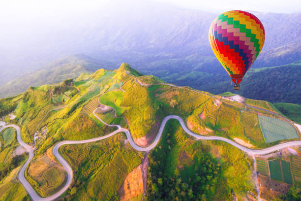 istock Hot air balloon on beautiful mountain 836099176