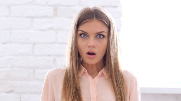 istock Wondering, Shock Gesturing by Woman in Office 836100820