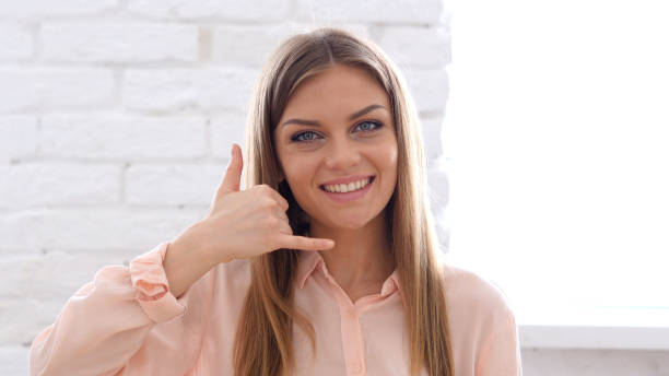 istock Call Us Customers, Woman Gesturing in Office 836101370