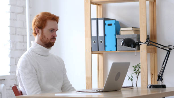 istock Tired Sleeping Creative Man with Red Hairs in His Office 836105346