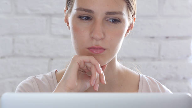 istock Pensive Woman Working, Thinking and Planning onLaptop 836105662