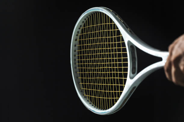 istock Tennis racket on black background 836110034