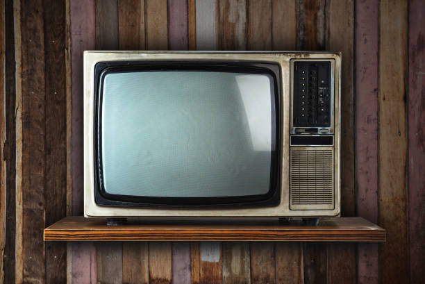 istock Vintage tv on wood shelf 836110060