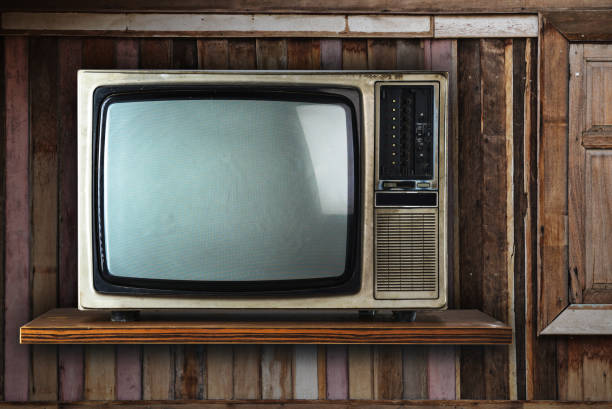 istock Vintage tv on wood shelf 836110076